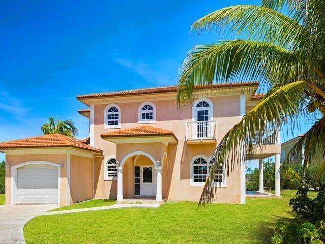 1. Single Family Homes for Sale at Fortune Beach, Freeport and Grand Bahama Bahamas