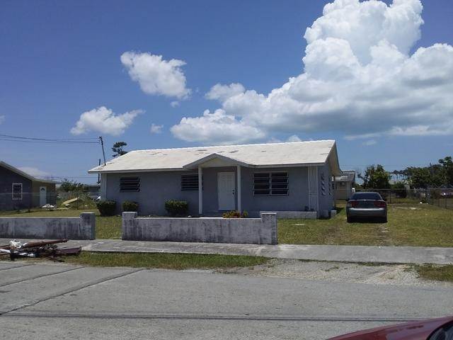3. Single Family Homes for Sale at Central Area, Freeport and Grand Bahama Bahamas